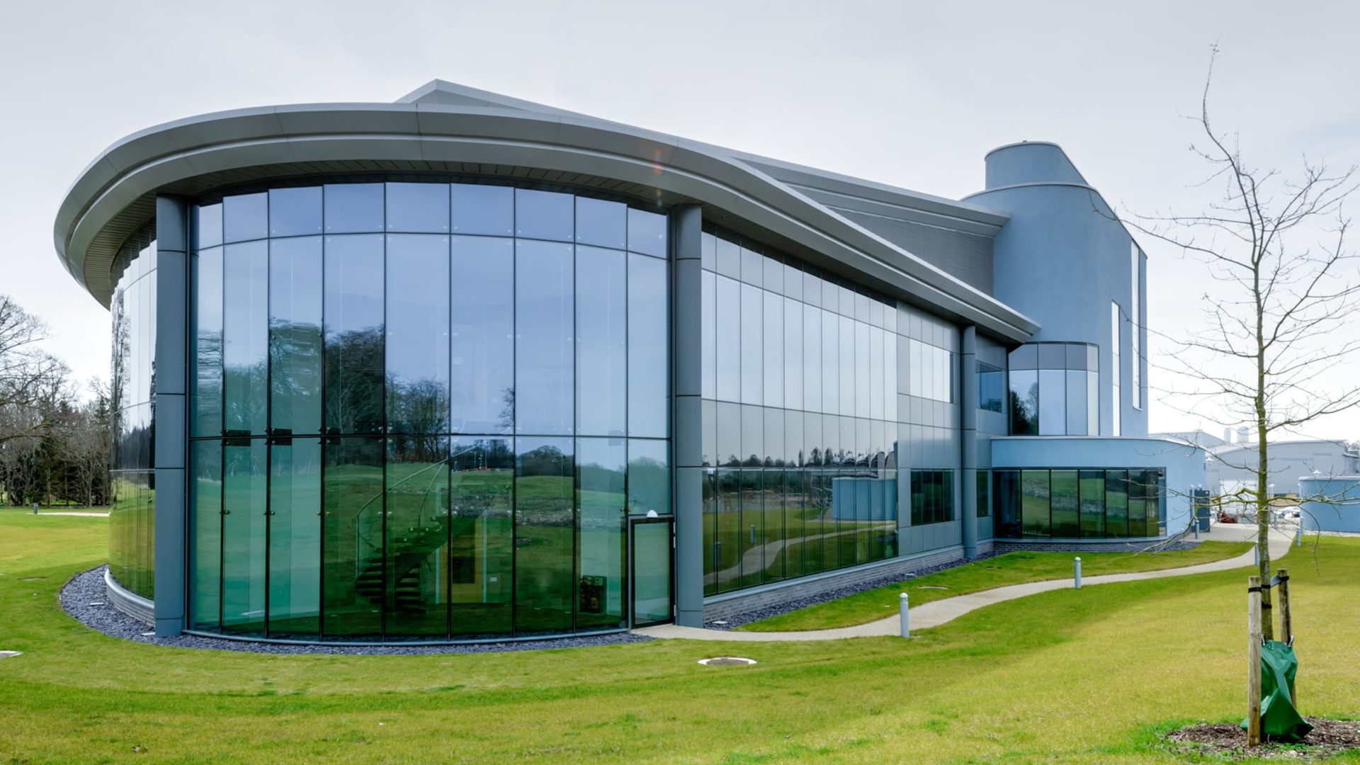 side view of babraham research campus building exterior with glass windows
