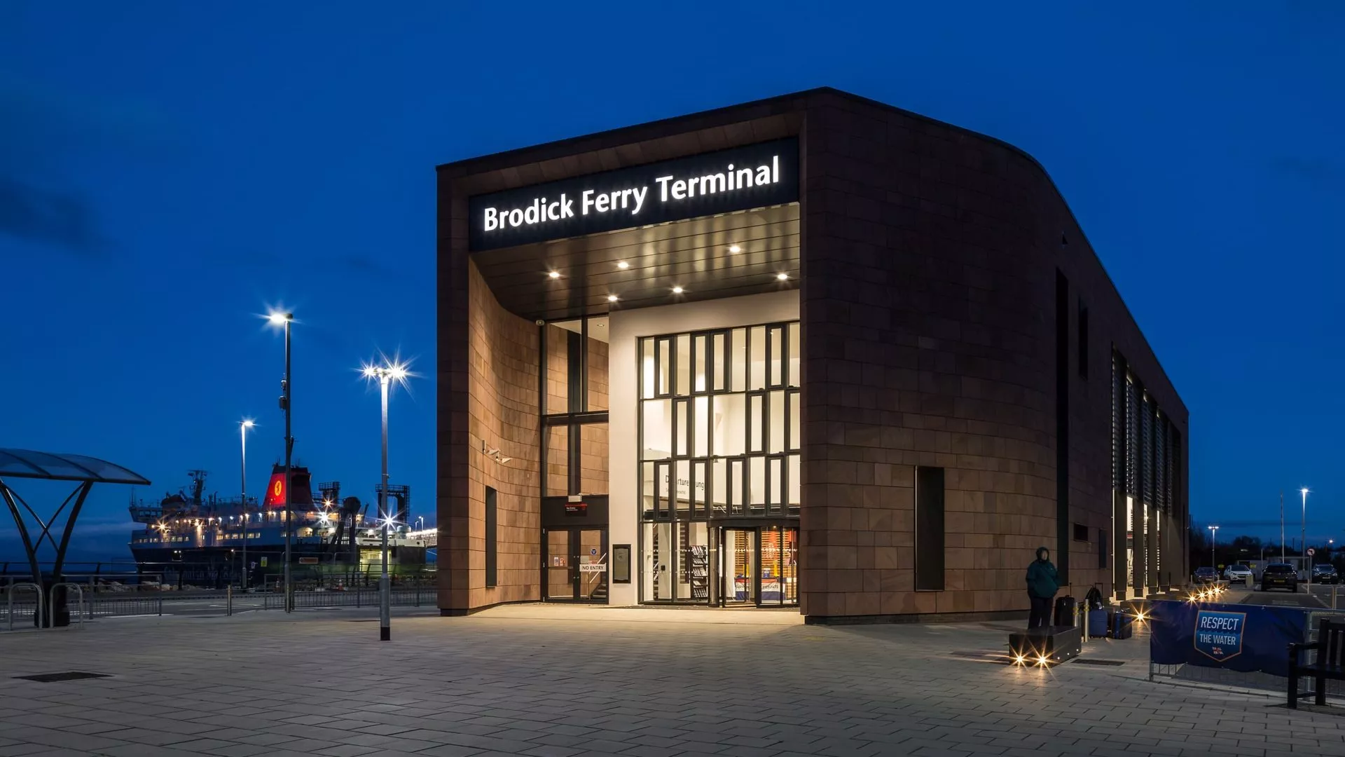 brodick ferry terminal building exterior front entrance at night