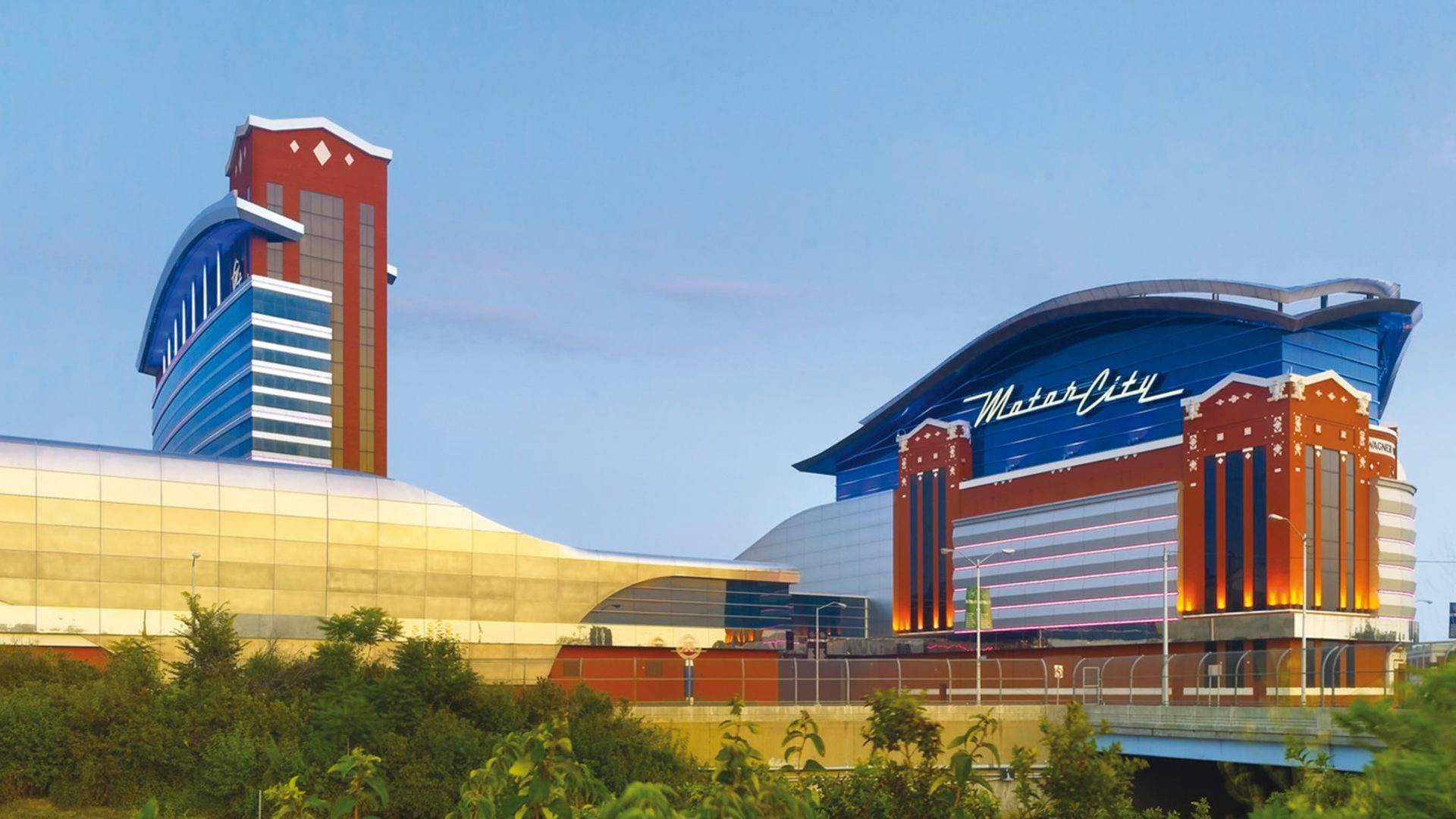 building exterior with trees at motorcity casino and hotel