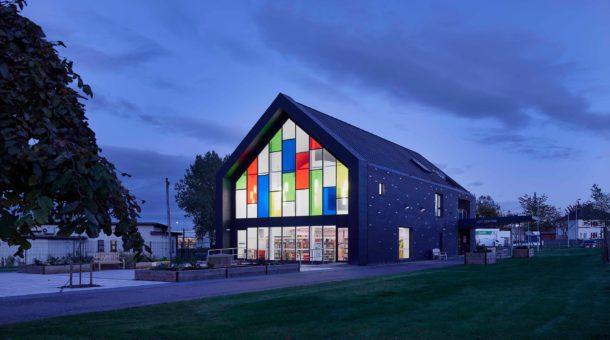 buidling exterior of newmains community trust centre at night