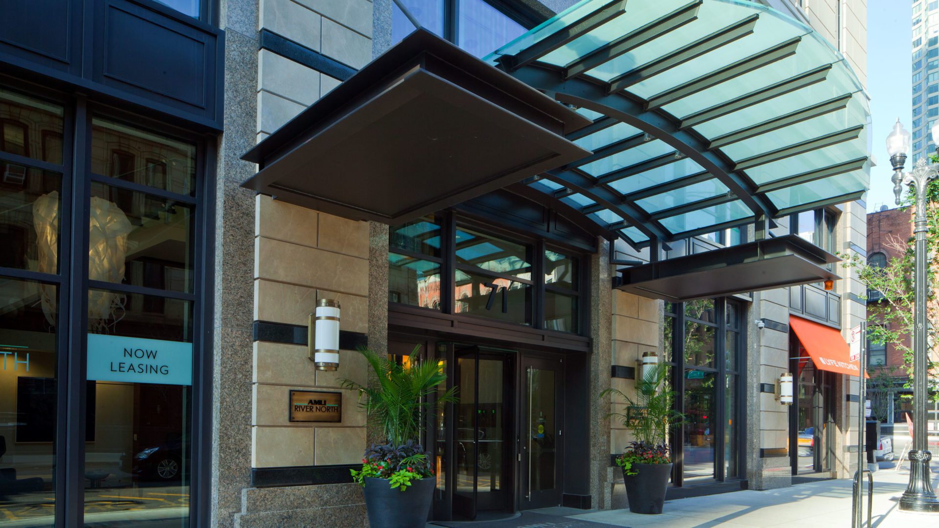 exterior entrance shot of river north rental apartments