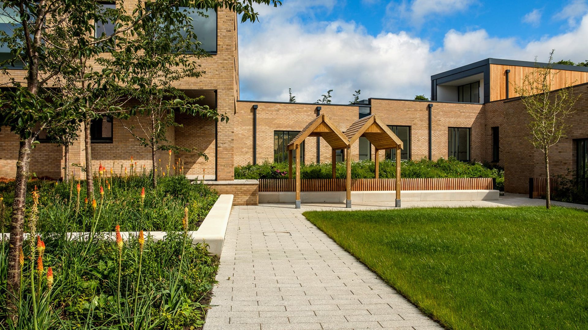 building exterior with flowers and trees at royal edinburgh hospital