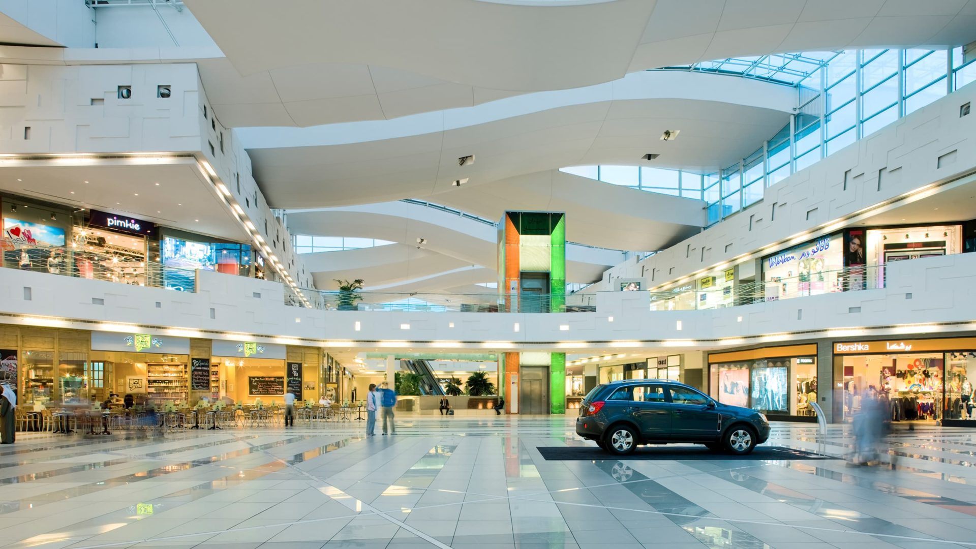 interior with a car and shops in the avenues building