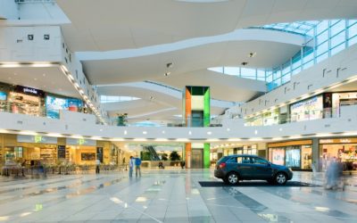 interior with a car and shops in the avenues building