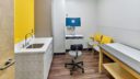 view of Roseville Examination Room. bright room with yellow accents