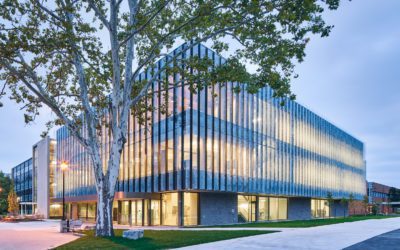 exterior of the essex centre of research, glass building with trees outside, University of Windsor