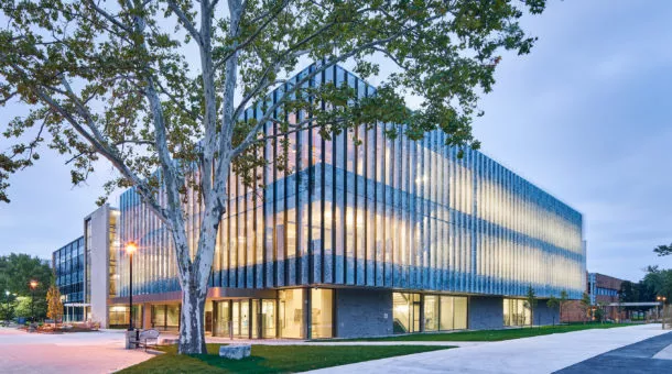 exterior of the essex centre of research, glass building with trees outside, University of Windsor
