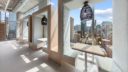 Coworking booths with full height glazed views of the city
