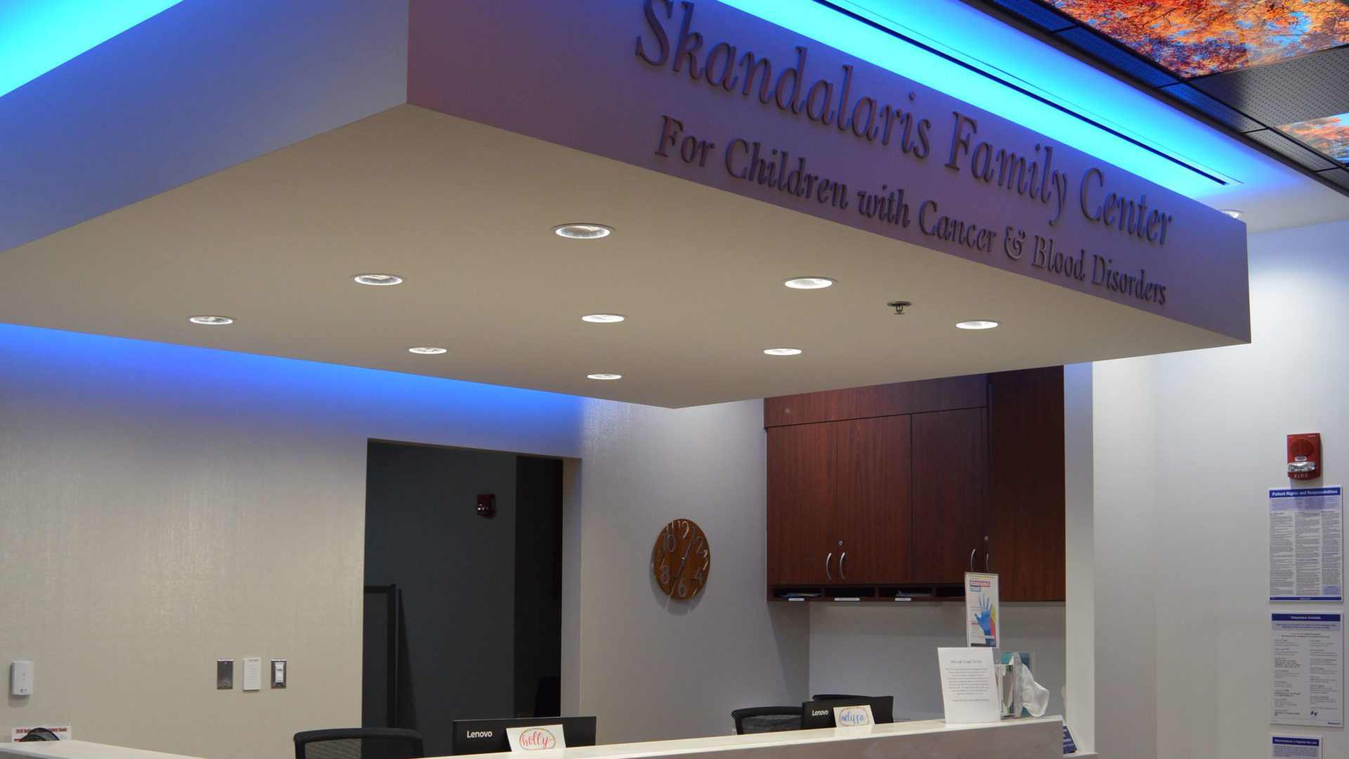 image of Center For Children With Cancer and Blood Disorders Reception area. sign reads "skandalaris family center"