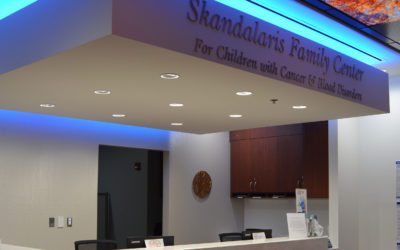 image of Center For Children With Cancer and Blood Disorders Reception area. sign reads "skandalaris family center"