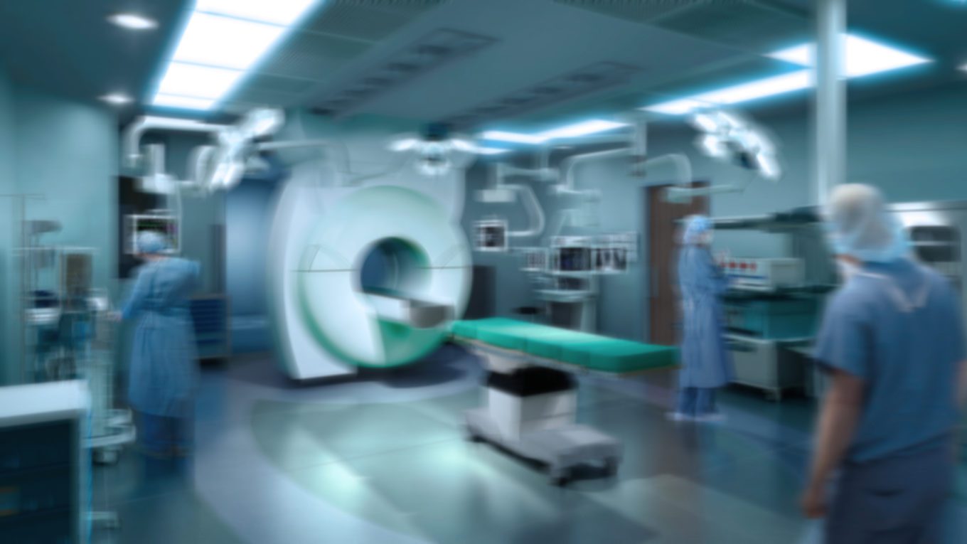 doctors in scrubs working in Peter Gilgan Patient Care