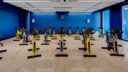 bicycle machines fill a room in 10XTO Athletic Club Gym