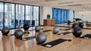 black yoga mats and exercise balls in 10XTO Athletic Club Yoga Studio