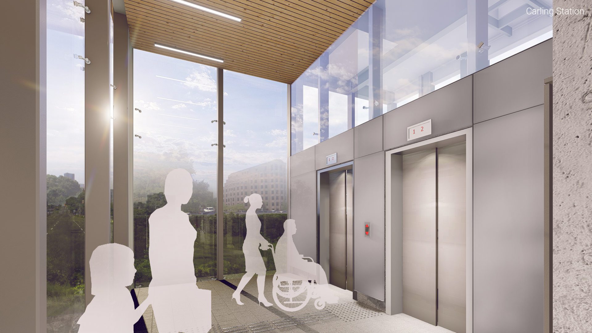 interior image of train station. a woman stands by a man in wheelchair waiting for elevator