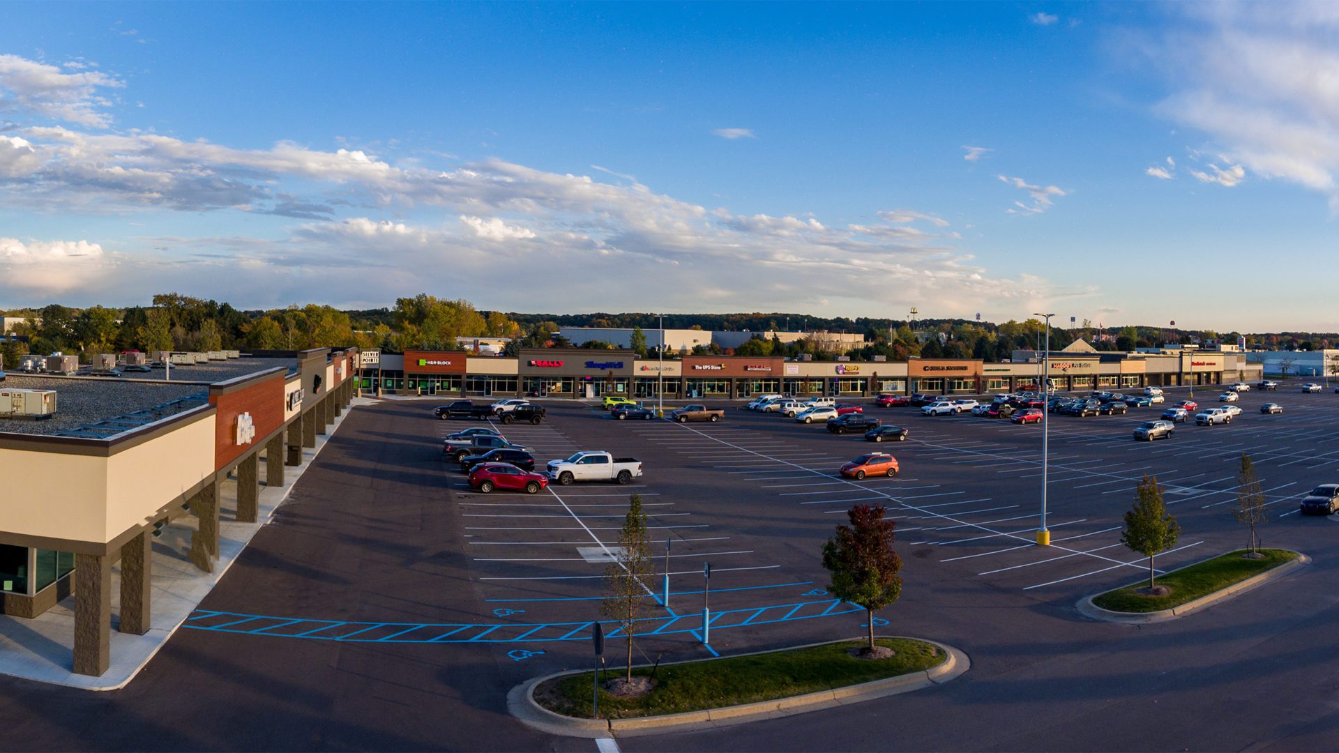 Silver Pointe Shopping Center Exterior. Brick plaza with a variety of different stores