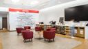 CBS Plasma Donor Centre Program Interior with red chairs and feature wall