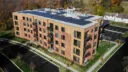 Hamilton at Eagleview: An overhead view highlighting the building's solar-paneled roof and eco-friendly design.