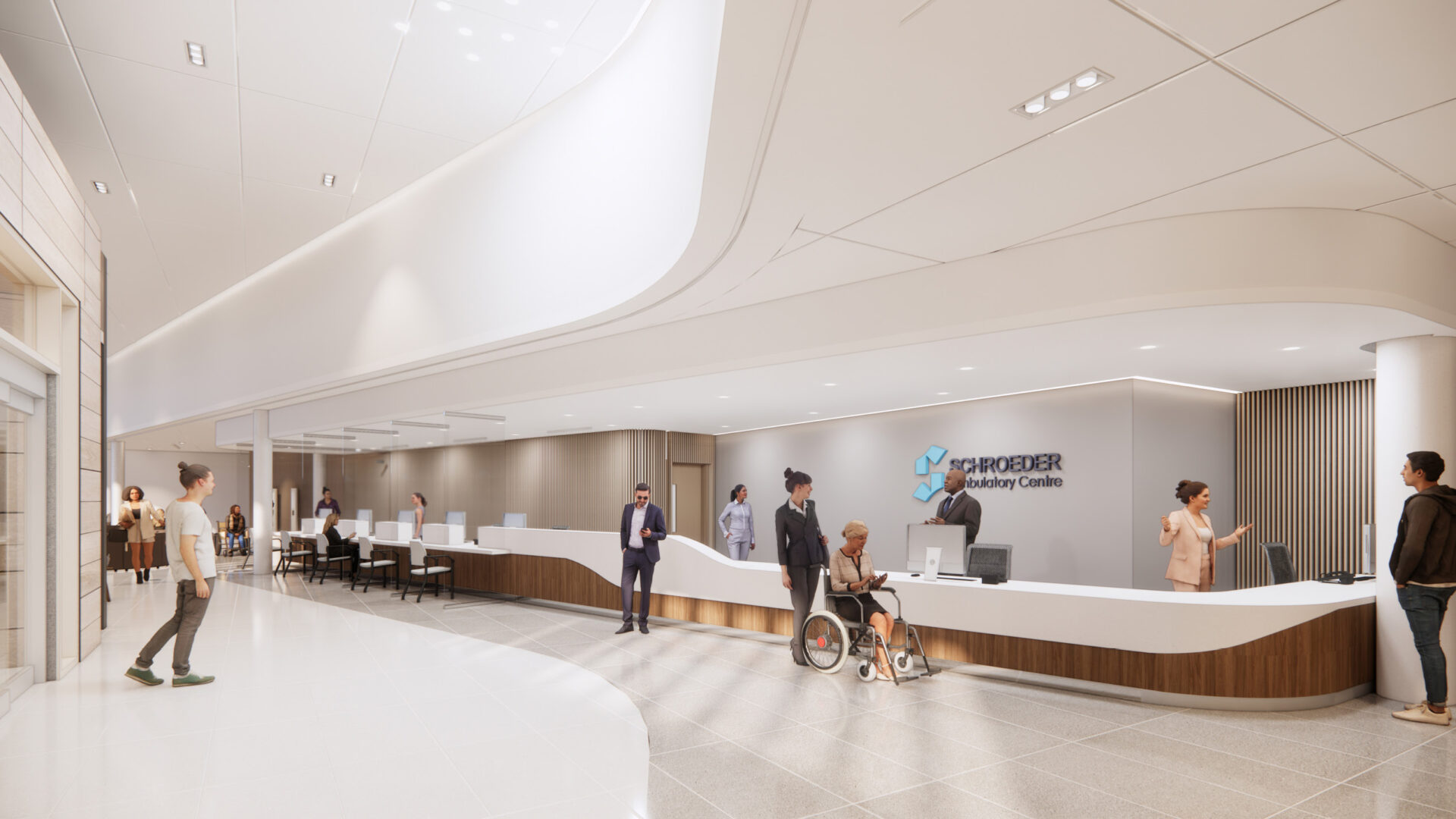 A contemporary interior view showing the reception desk of the Schroeder Ambulatory Centre. Staff and visitors interact in a spacious, well-lit area with modern furnishings.