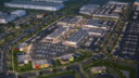 Aerial view of Rock Run Collection mixed-use development with road network and multiple buildings.