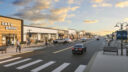 Retail street at Rock Run Collection with storefronts, sidewalks, seating, and crosswalks.